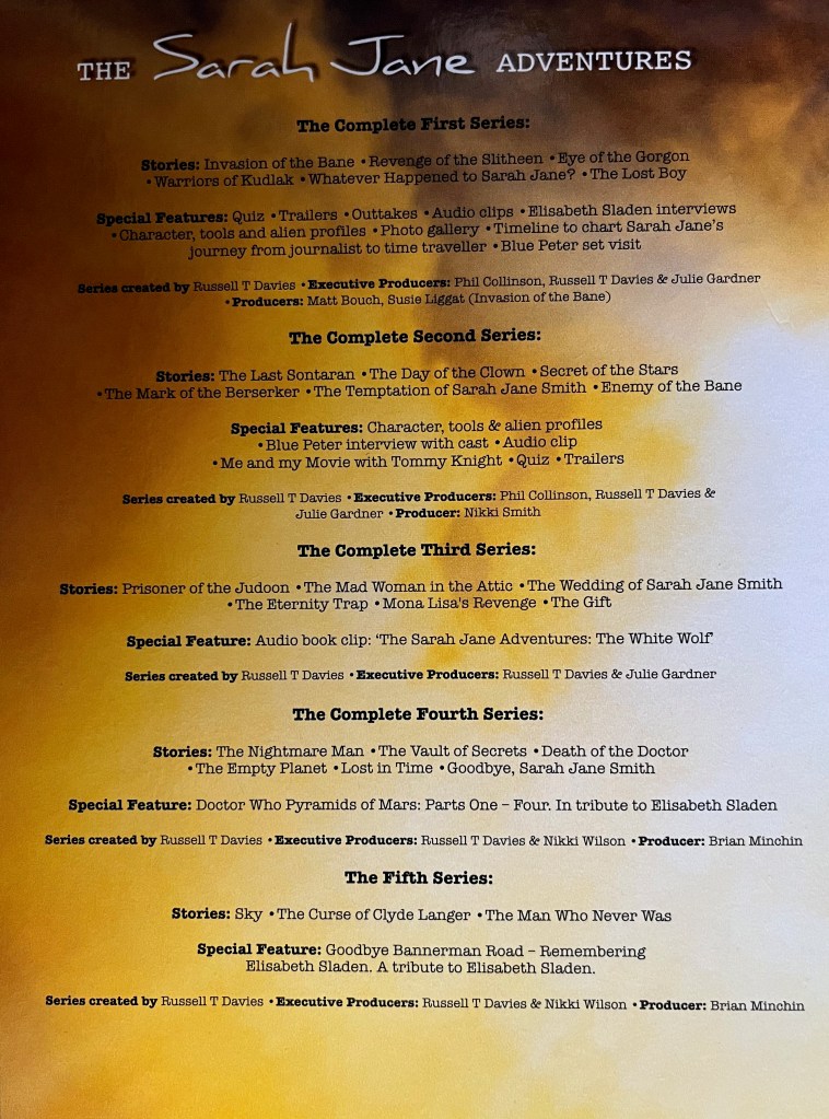 A panel from the DVD box set of The Sarah Jane Adventures, listing the episodes and extra features for each of the 5 series.
