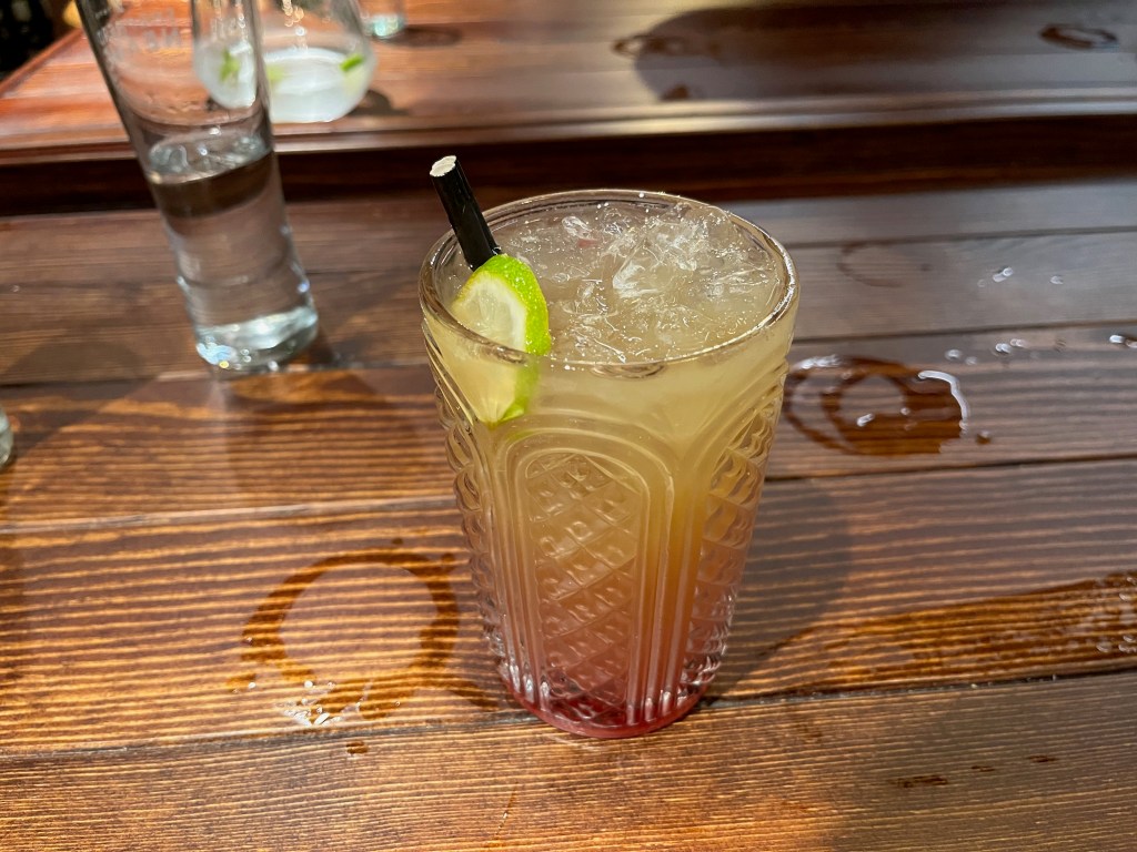 A Jamaican Rum Runner cocktail, described on the menu as a tropical blend of citrus and fruity flavours, consisting of white rum, spiced rum, orange juice, lime juice and pineapple juice.