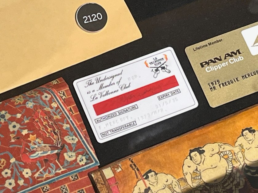 A white membership card with a red signature strip for La Valbonne Club, next to a gold card for Pan Am Clipper Club.