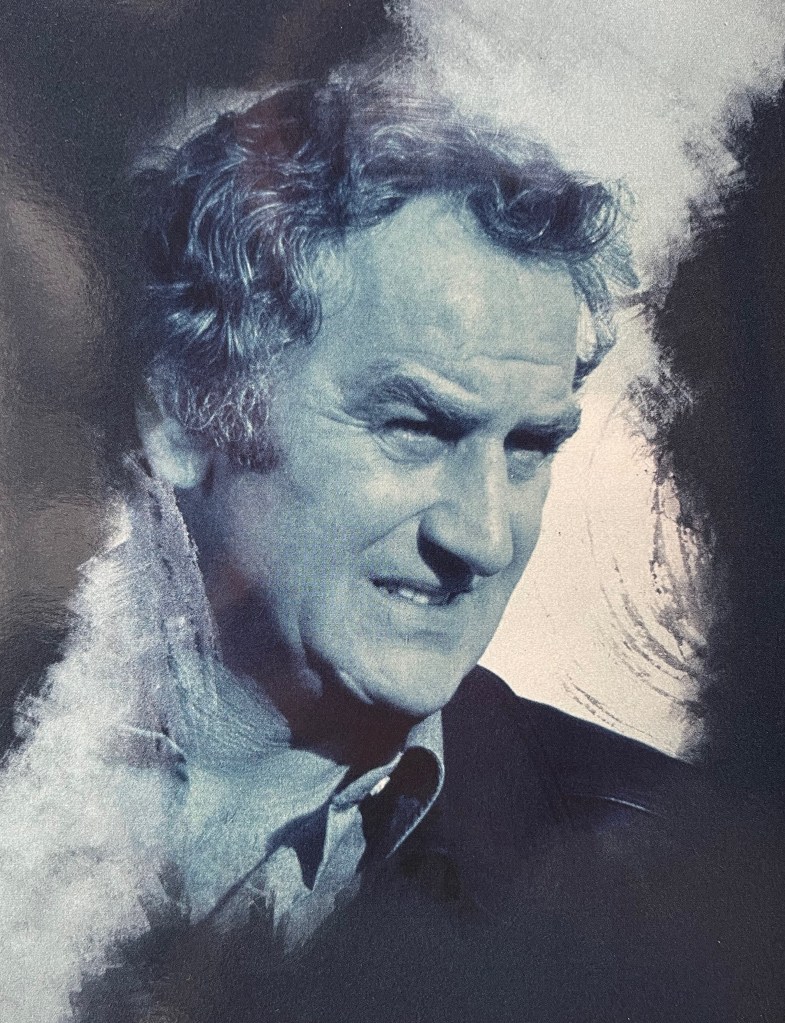 A blue-tinted image from one of the panels in the Blu-ray box set for The Sweeney Series 1, showing Regan with an angry look on his face.