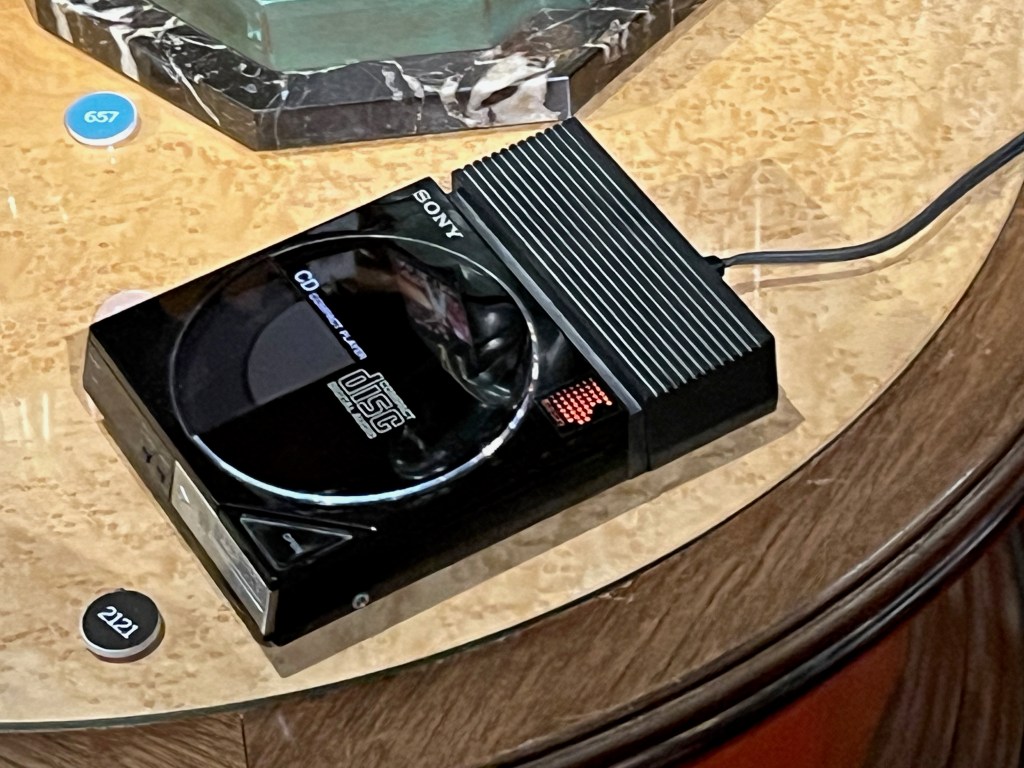 A small, black Sony compact CD player.