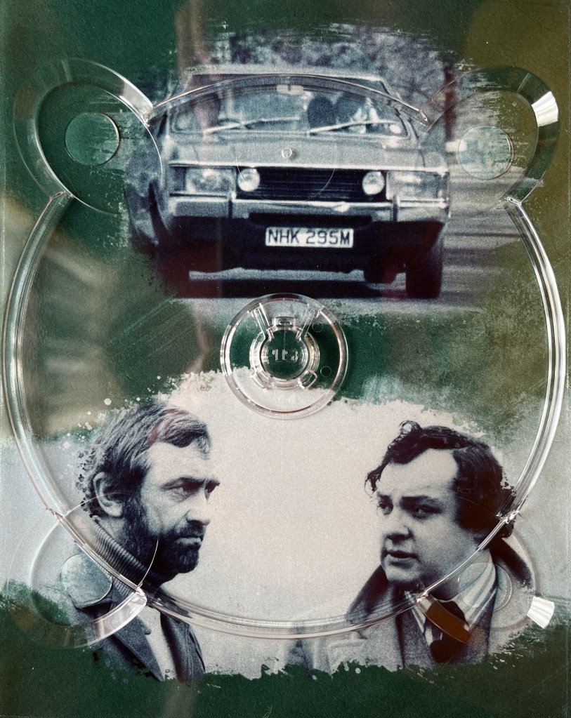 A panel with a green background from the Blu-ray box set for The Sweeney Series 2. It has 2 black and white images, the top one showing a face-on view of a car being driven along a road with Regan in the passenger seat, while the bottom image shows two men talking to each other, one with a beard and moustache while the other is clean-shaven. The images are behind a plastic holder for one of the Blu-ray discs.