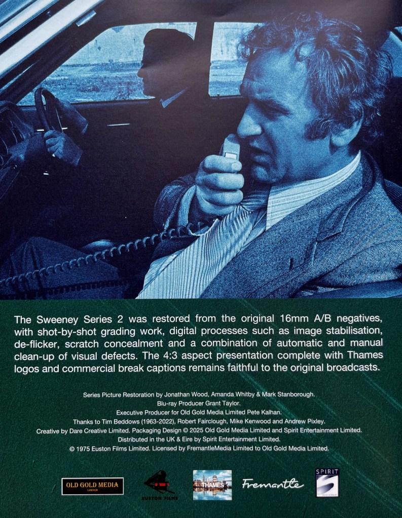 Back cover of the booklet included in the Blu-ray boxset for The Sweeney Series 2. It shows a blue-tinted image of Regan talking into a car radio as he's driven along, taken from the opening titles of the series, below which is text explaining how the episodes were restored and remastered from the original 16mm negatives.