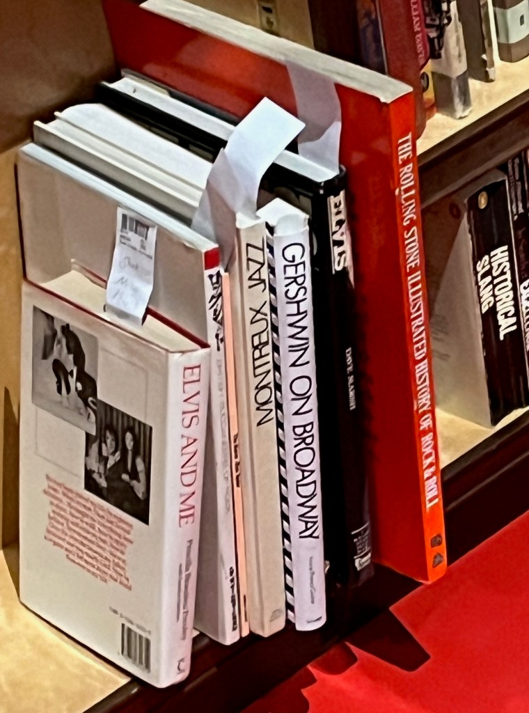 A collection of 8 books about music, including titles about Elvis Presley, Bernie Taupin and George Gershwin.