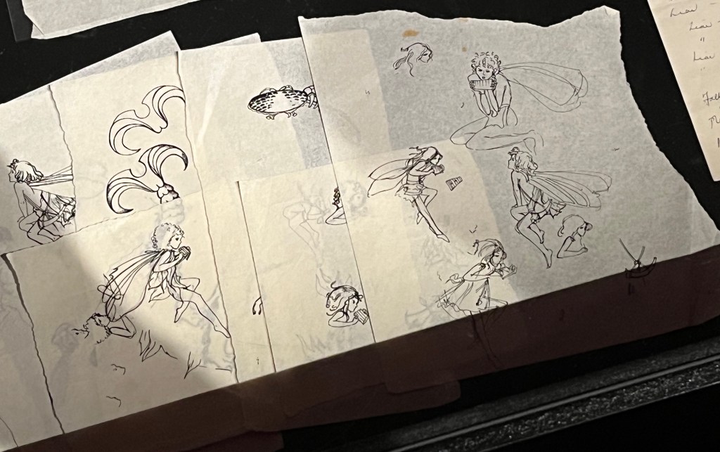 Freddie Mercury's ink drawings of fairies and other items relating to the crest for the band Queen.