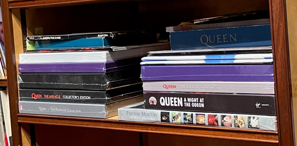 A selection of Queen & Freddie Mercury records from Freddie's record collection, including Queen's Platinum Collection, Absolute Greatest, the Collector's Edition of The Miracle, Queen's self-title debut album, The Game, A Night At The Odeon and The Freddie Mercury Solo Collection.