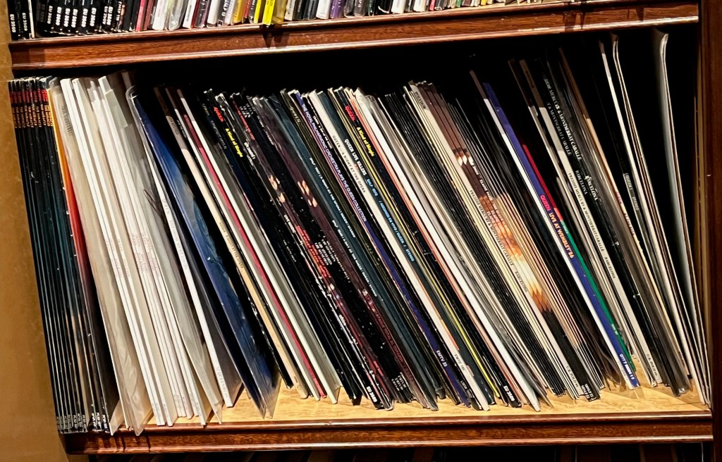 A selection of Queen & Freddie Mercury records from Freddie's record collection, including The Miracle, A Kind Of Magic, Greatest Hits 2, A Night At The Opera, Sheer Heart Attack, Live Killers,, Live At Wembley 86, The Royal Philharmonic Orchestra Plays The Queen Collection, The Queen Album by Elaine Paige, and Freddie's solo album Barcelona with Montserrat Caballé.