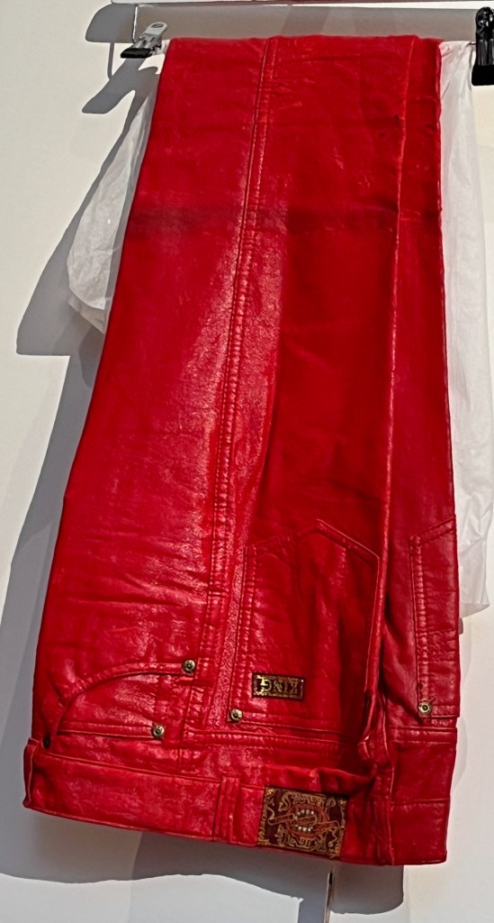 A pair of red vinyl jeans.