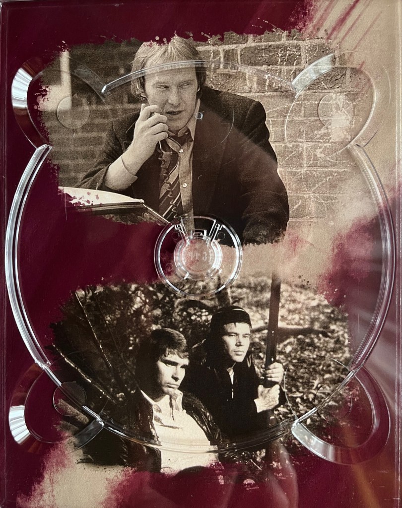 Two black and white photos. The top one shows Carter using the telephone, while the bottom one shows two men sat together, with one of them holding a shotgun. The images are placed on a red background, and are from one of the panels in the Blu-ray box set for The Sweeney Series 3.