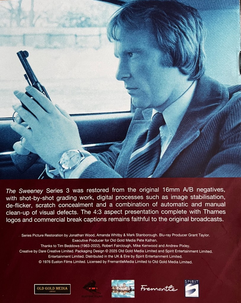 Back cover of the booklet included in the Blu-ray boxset for The Sweeney Series 3. It shows a blue-tinted image of Carter sitting in a car and holding a gun, taken from the opening titles of the series, below which is text explaining how the episodes were restored and remastered from the original 16mm negatives.