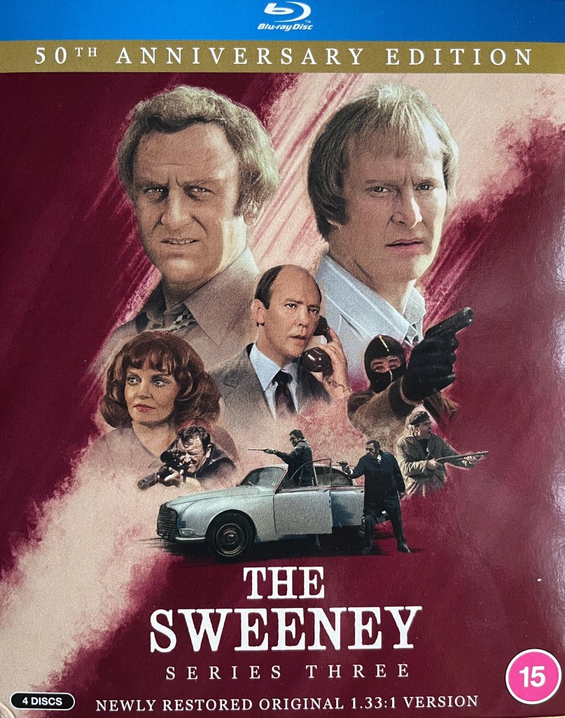 Front cover for The Sweeney Series 3 on Blu-ray, showing a large colour image of Regan and Carter, played by John Thaw and Dennis Waterman. Below them are images from the series including Haskins on the phone, several men holding guns, and a female character from the series.