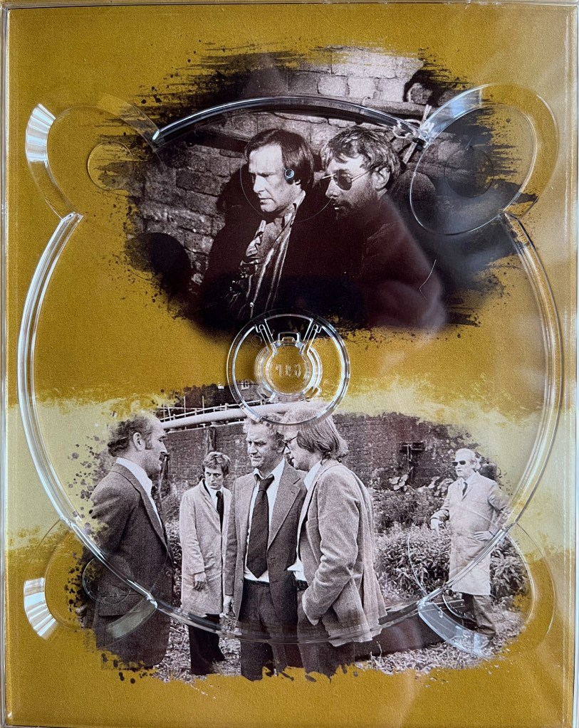 2 black and white photos. The top photo shows Carter and a man wearing dark glasses sat against a brick wall in a shadowy space. The bottom photo shows Regan and Carter talking to a man outside, while a couple of other men watch on in the background. The images are placed on a gold background, and are from one of the panels in the Blu-ray box set for The Sweeney Series 4.