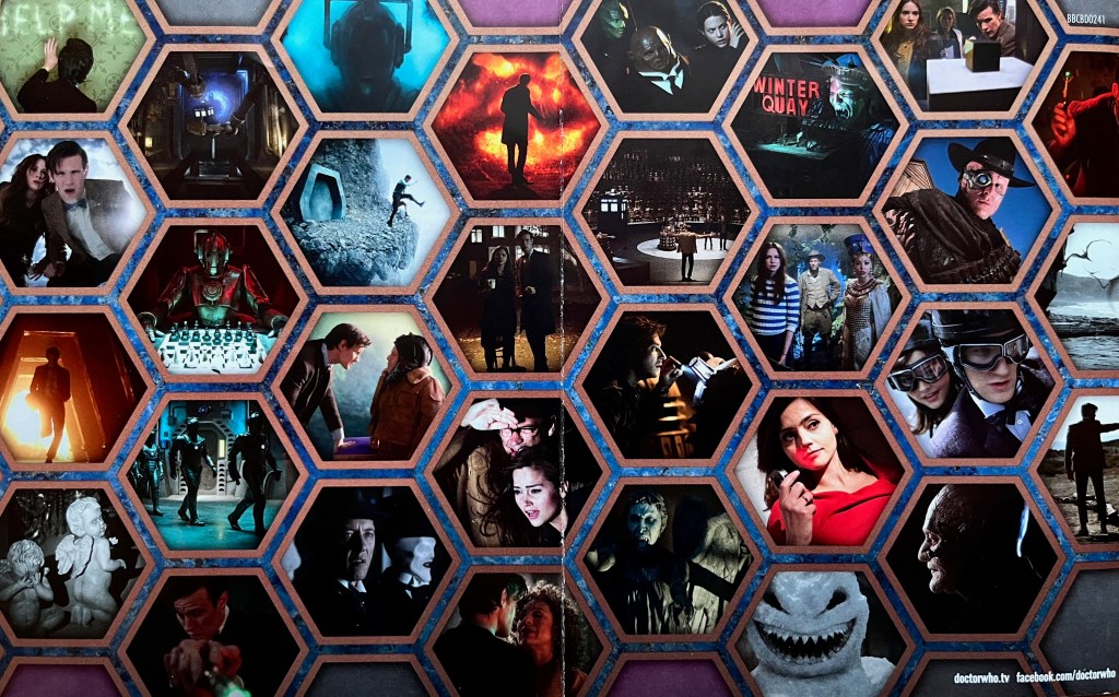 A double-page spread from the booklet that came with the old Blu-ray edition of Doctor Who Series 7, showing a collage of hexagons containing images from the series.