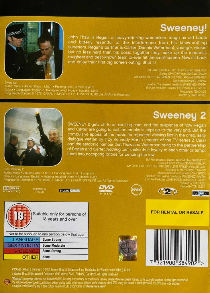 Back cover of the DVD for both Sweeney films. On the top half, next to the description of the first film, is a photo of Regan blowing into a breathalyser bag while watched by a policeman. On the bottom half, next to the description of the second film, is a photo of two men with guns, one of whom is threatening a uniformed man.