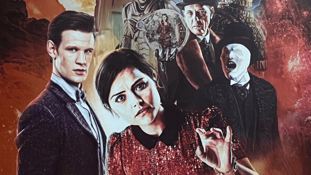 Part of the cover artwork for the Doctor Who Series 7 Blu-ray steelbook, showing Matt Smith's Doctor standing next to Clara, while behind them stands The Great Intelligence holding a snow globe with an image of Clara inside it.