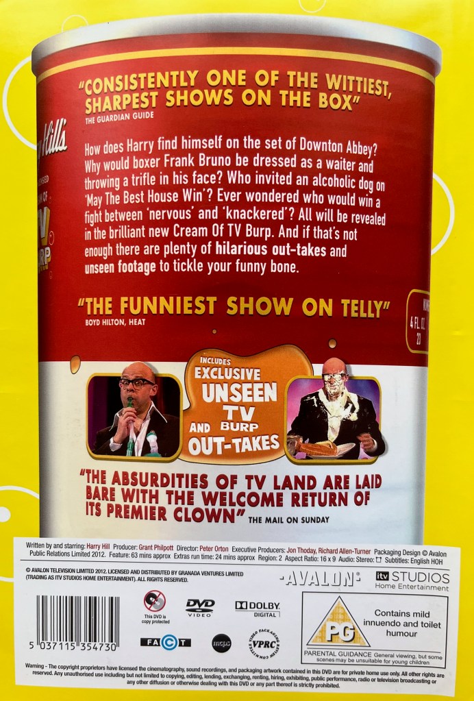 Back cover of the DVD for Harry Hill's Cream Of TV Burp, with the description written on the back of a large can of soup, the label of which is red on the top half and white on the bottom half. Just below the description are a couple of small images of Harry in the show, one with him sucking on a long tube, and the other with cream all over his face.