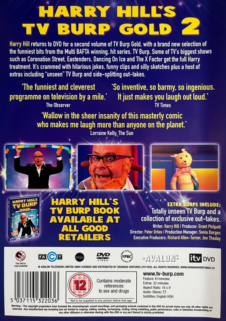 Back cover of the DVD for Harry Hill's TV Burp Gold 2, containing a few images from the show below the description of the DVD, including Harry raising his arms in excitement, Harry smiling with rashers of bacon on each cheek and a sausage sticking out of each ear, and the small knitted puppet character.