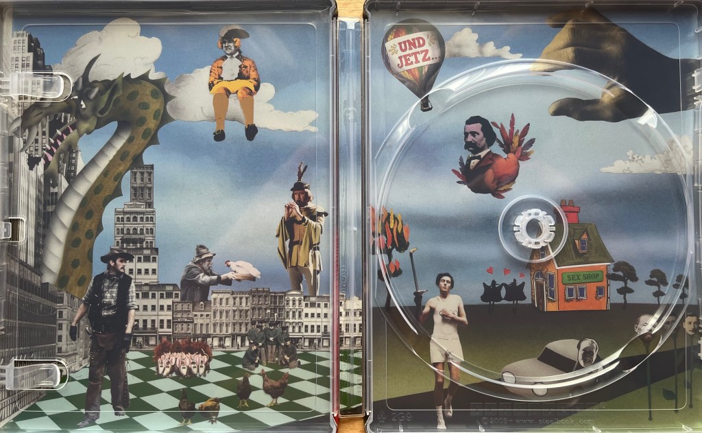 The interior artwork of the Blu-ray steelbook for Monty Python’s Fliegender Zirkus, showing a colourful scene with various random people scattered around, one of whom is sitting on a cloud in the sky. On the left there is also a large dragon devouring a skyscraper, while on the right there is a large foot about to stamp down on the scene.