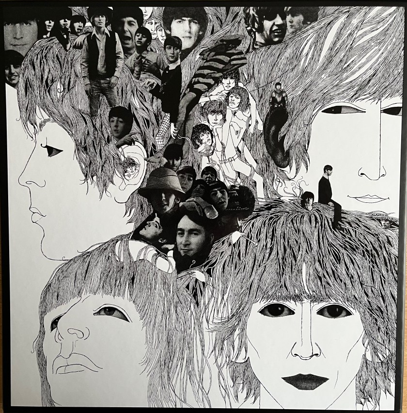 Front cover of the super deluxe box set for the album Revolver by The Beatles. It shows large black and white sketch-style headshots of the 4 band members, with smaller black and white photos of them in the spaces in between.