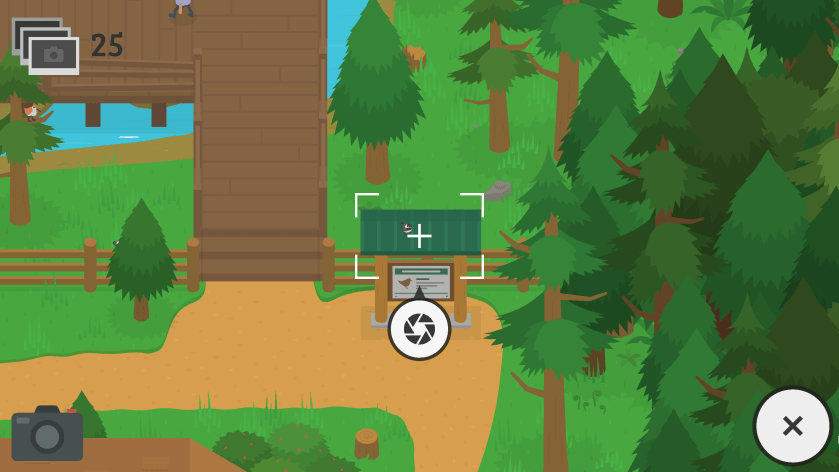 Screenshot from the game Sneaky Sasquatch, showing the frame of the camera as it's being lined up to take a photograph of a small colourful bird on top of a sign in the bird sanctuary.